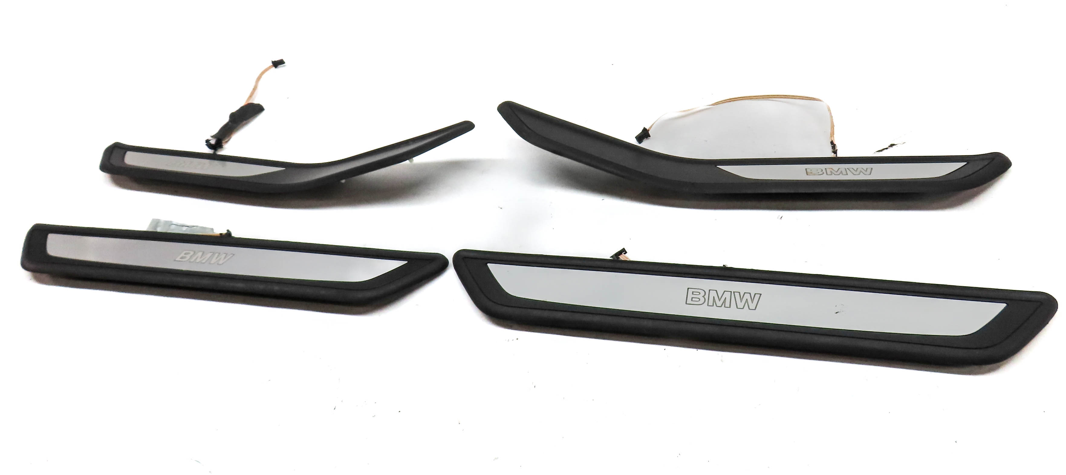 11 BMW 740i (F02) FRONT & REAR / LEFT & RIGHT LIGHTED DOOR SILL SCUFF TRIM SET/4 — exact item pictured